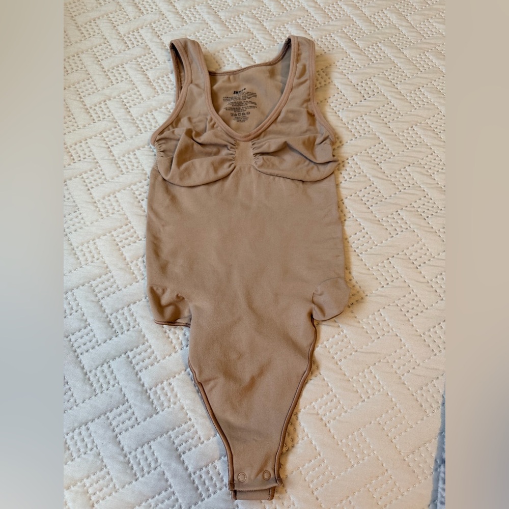 SKIMS Sculpting Bodysuit in Taupe Nude